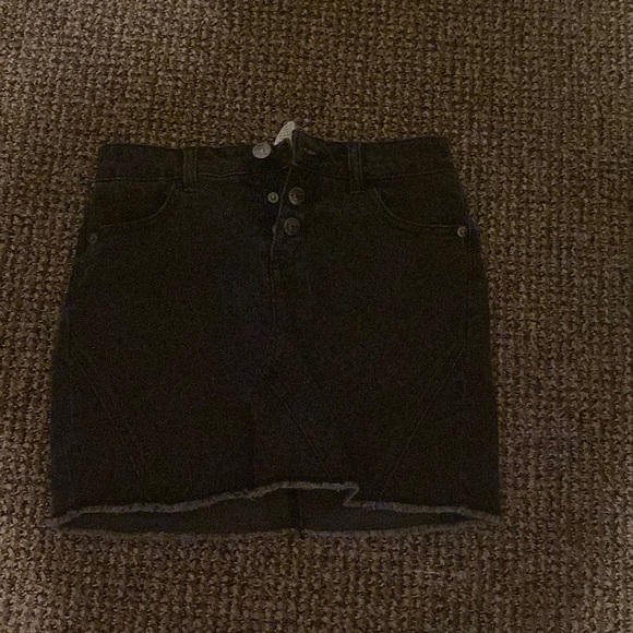 Black jeans skirt size 12 but runs bigger then that - Picture 1 of 1